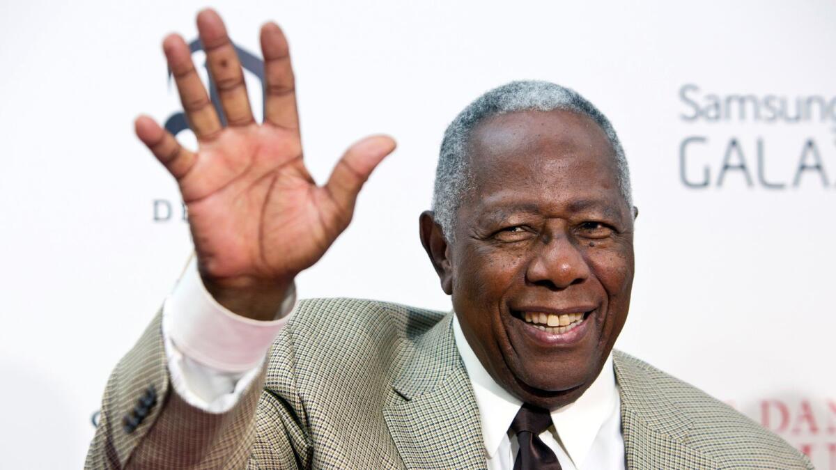Hank Aaron was elected to the Hall of Fame on his first ballot in 1982 . — Reuters file