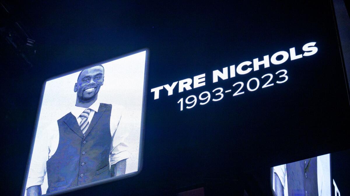 The screen at the Smoothie King Center in New Orleans honors Tyre Nichols before an NBA basketball game between the New Orleans Pelicans and the Washington Wizards, Jan. 28, 2023. — AP