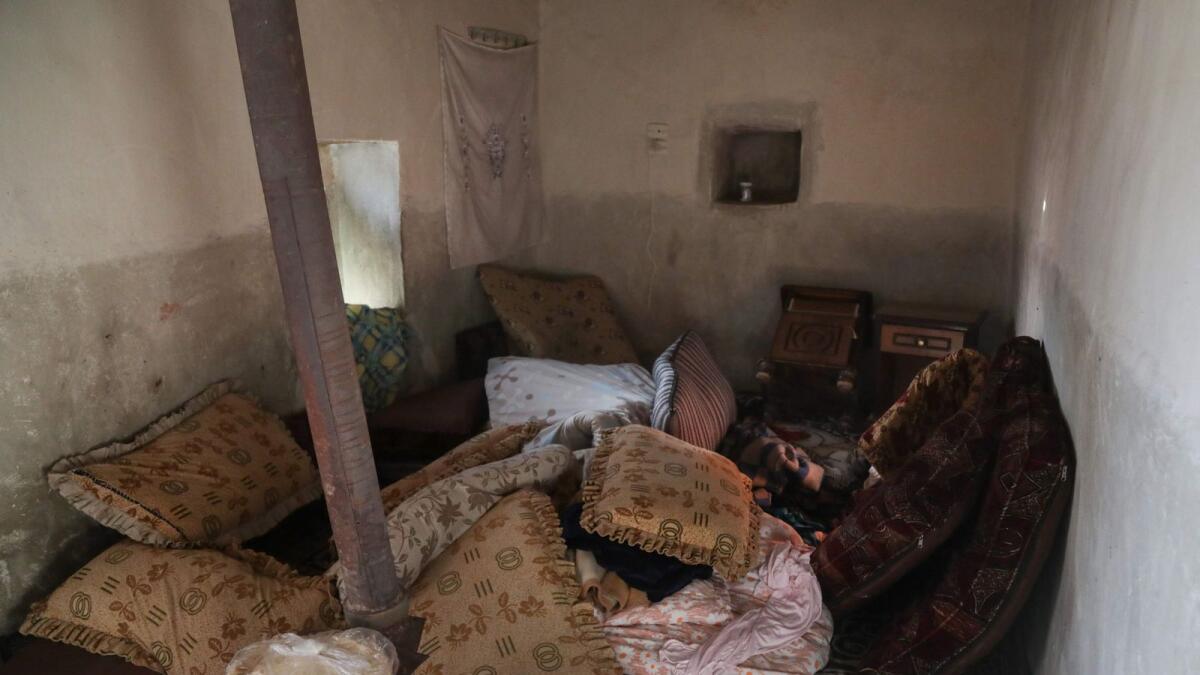 A picture shows the interior of a house, following a US helicopter raid on a Daesh group leader, in Soueida near Jarablus, in the north-east of Syria's Aleppo province, on Monday. — AFP