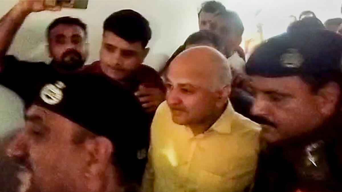 Delhi Deputy Chief Minister Manish Sisodia being produced before the Rouse Avenue court by CBI officials a day after his arrest in the excise policy case in New Delhi on Monday. — PTI