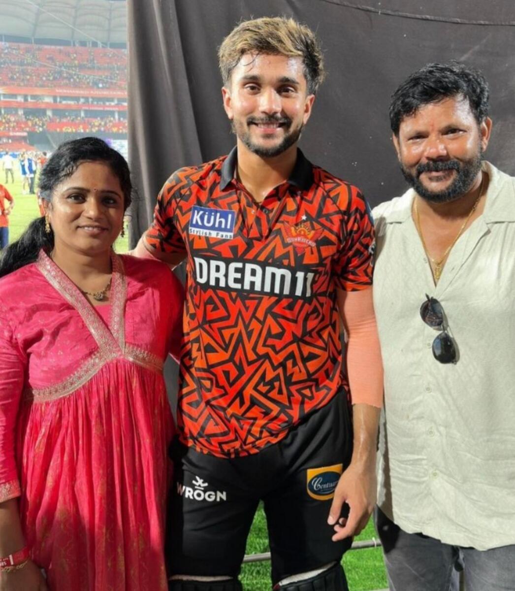 Nitish Reddy with his parents. — X