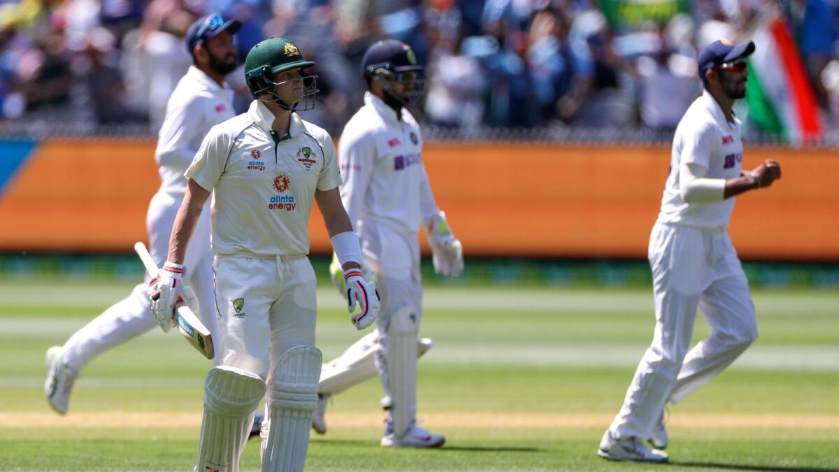 Australia's Steve Smith walks from the field after he was dismissed for no score. — AP