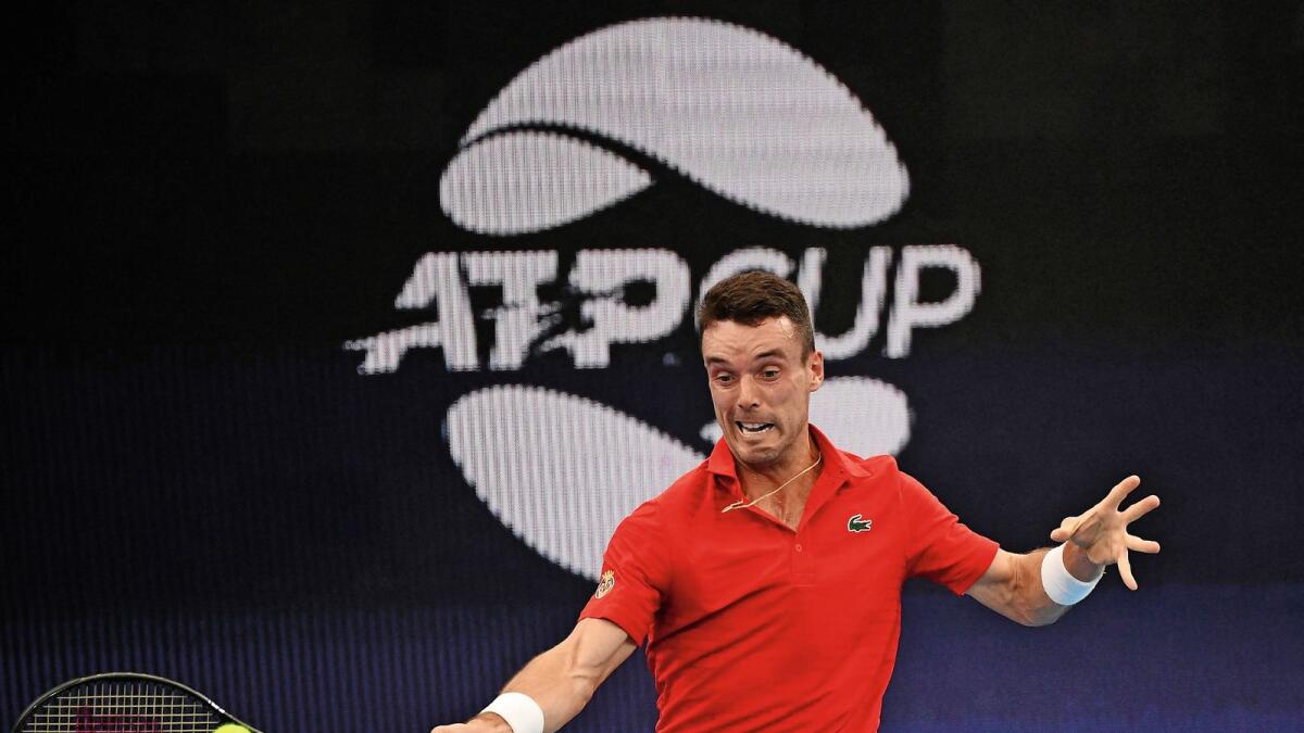 Spain's Roberto Bautista Agut plays a forehand against Chile's Christian Garin on Saturday. — AFP