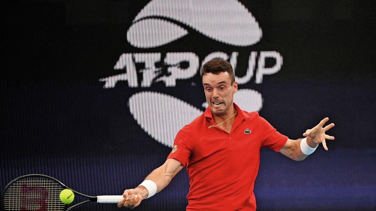 Spain's Roberto Bautista Agut plays a forehand against Chile's Christian Garin on Saturday. — AFP