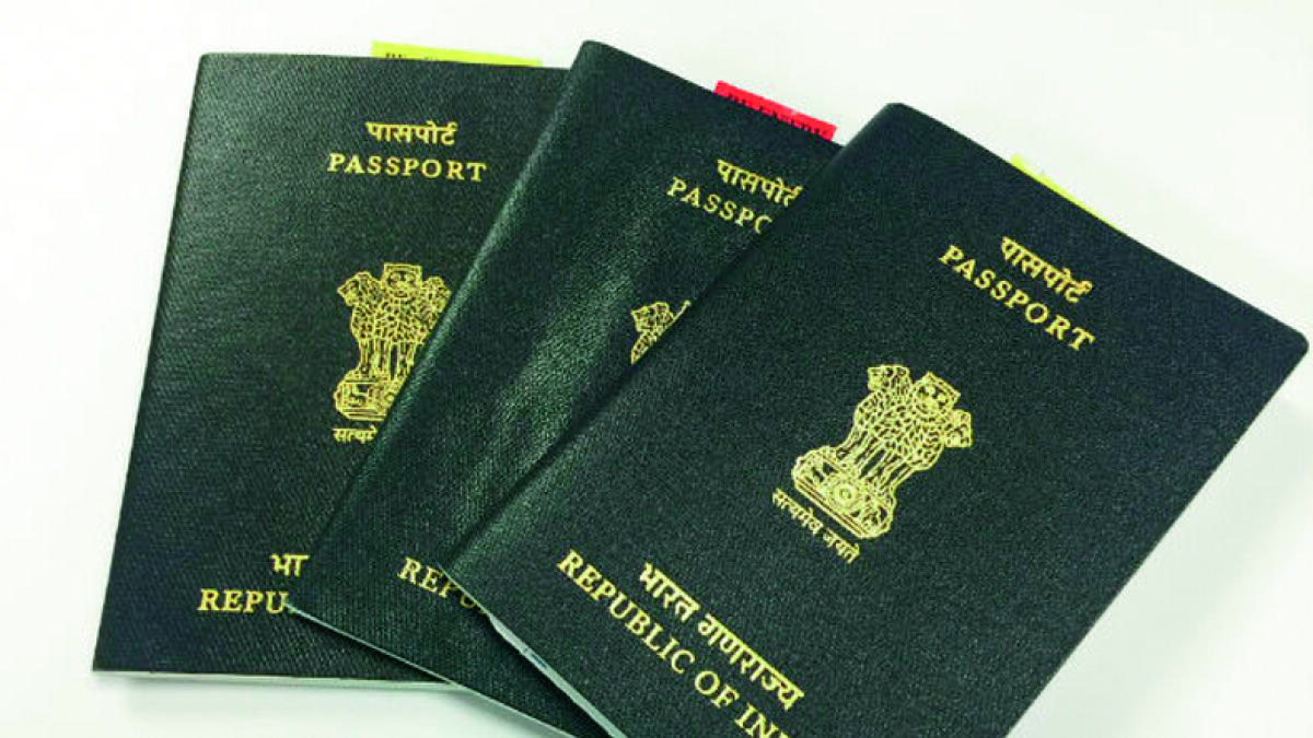 India scraps plan for orange-coloured passports
