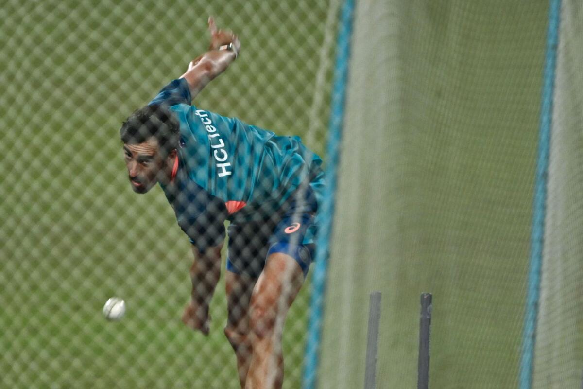 Australia's Mitchell Starc bowls in the nets during a practice session at the Eden Gardens in Kolkata. — AFP