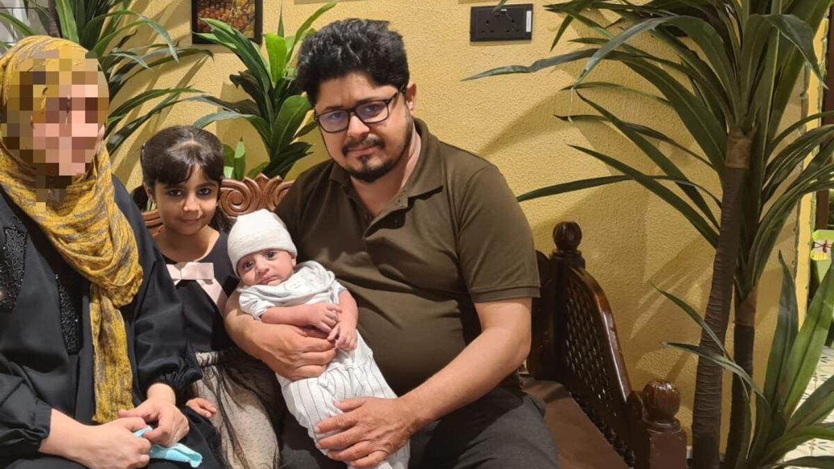 Numan Khan Muhammad Bashir (right) with his family. Photo: Supplied