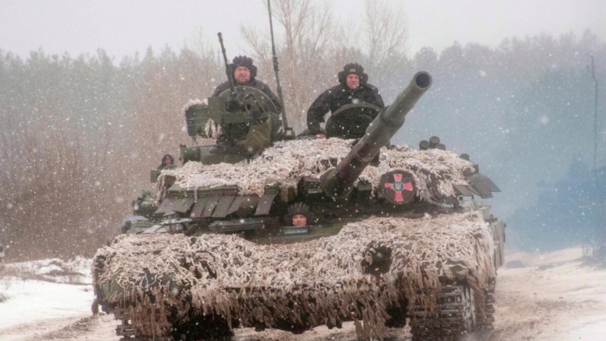 A Ukrainian tank moves during military drills close to Kharkiv. — AP