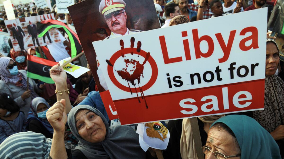 Supporters of Libyan military strongman Khalifa Haftar take part in a gathering in the eastern Libyan port city of Benghazi to protest against Turkish intervention in the country's affairs.  Photo: AFP