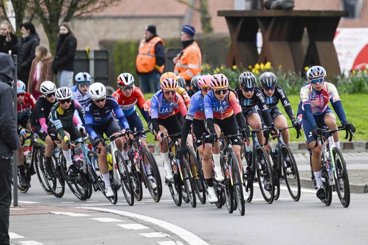 Italy's Eleonora Gasparrini of UAE Team ADQ (C) rides in the pack during the women's  Tour of Flanders. - AFP