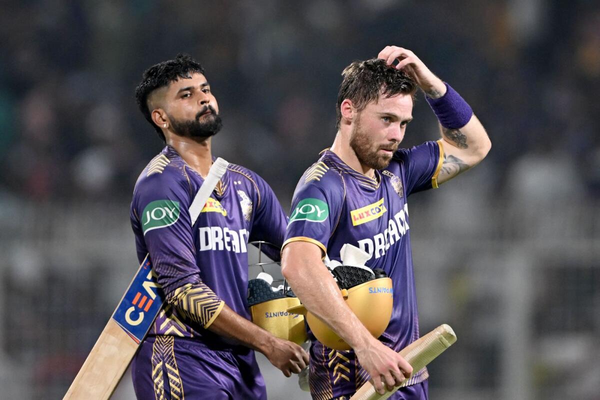Kolkata Knight Riders captain Shreyas Iyer (left) and Phil Salt walk back to the pavilion after their win against Lucknow Super Giants. — AFP
