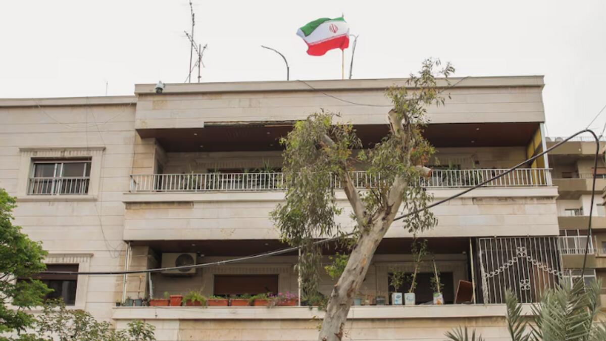 The Iranian flag flutters on the new Iranian consulate building after the country's consulate in Damascus was targeted in an attack on April 1. Photo: Reuters
