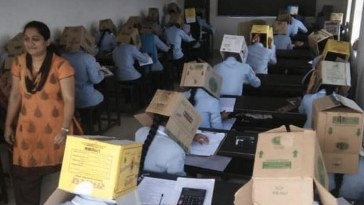 Students, india,  wear cartons cheating