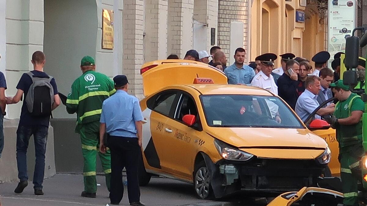 A view shows a damaged taxi, which ran into a crowd of people, in central Moscow, Russia.- Reuters