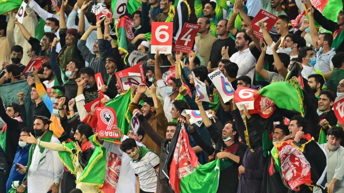 Afghanistan fans at the Dubai International Cricket Stadium. (Photo by M. Sajjad)
