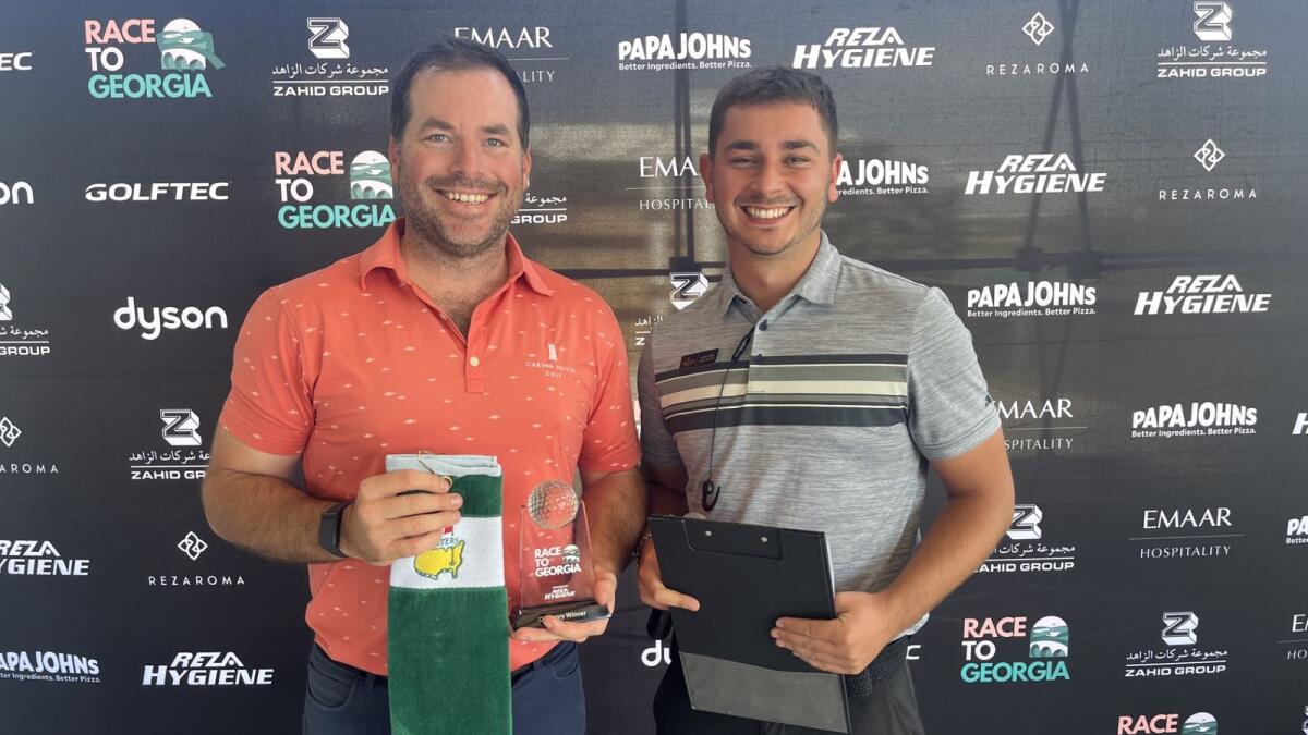 Mike Pugliese (left) winner of the Race to Georgia qualifying round at Trump International Golf Club with Joshua Smith, Golf Ops Supervisor. -  Supplied photo