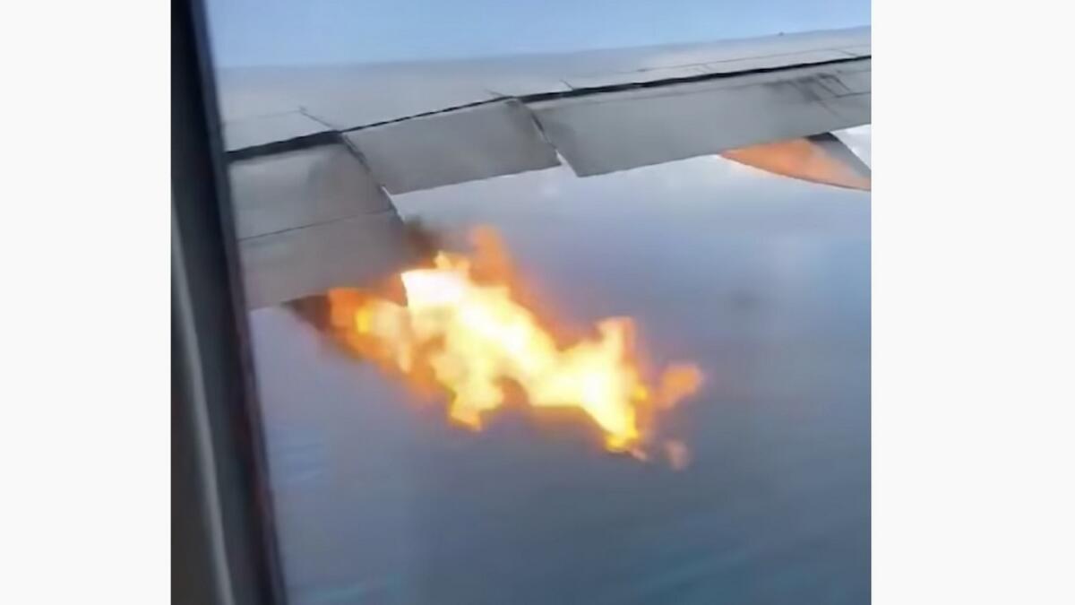 passenger plane, engine, catches fire, fire, engine fire, emergency landing, mid flight, mid air, philippine airlines, los angeles