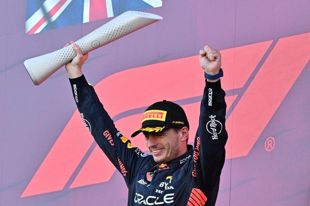Red Bull Racing's Dutch driver Max Verstappen celebrates on the podium. — AFP