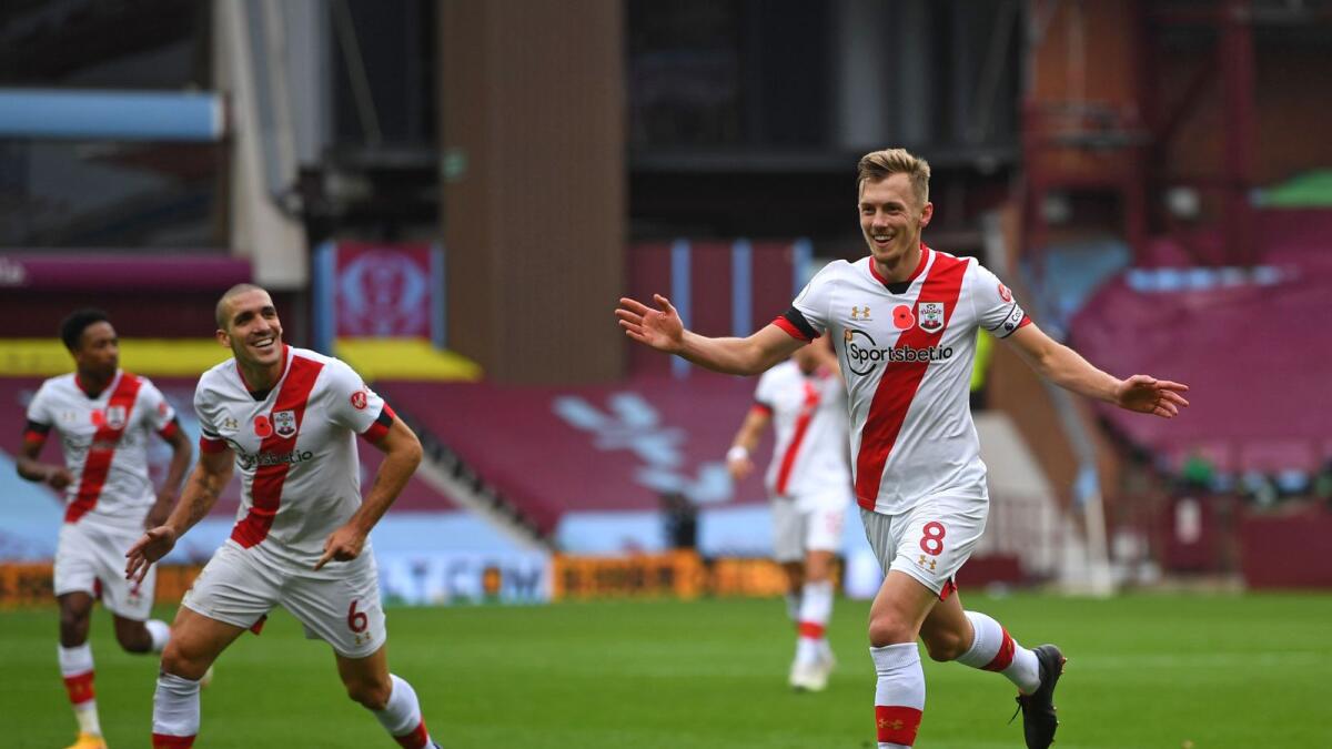 Southampton's English midfielder James Ward-Prowse (right) celebrates after scoring their third goal against Aston Villa. — AFP