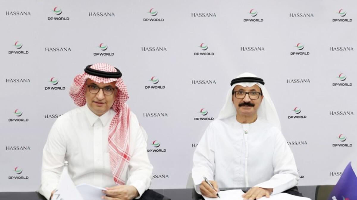 Saad bin Abdulmohsen Al Fadly, CEO of Hassana Investment Company, and Sultan Ahmed bin Sulayem, Group Chairman and CEO of DP World, signing the agreement. — Supplied photo