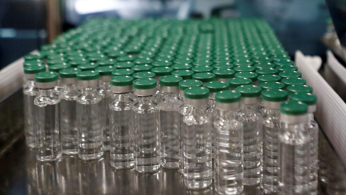 Vials of AstraZeneca's COVISHIELD, coronavirus disease (COVID-19) vaccine are seen before they are packaged inside a lab at Serum Institute of India, in Pune, India, November 30, 2020.