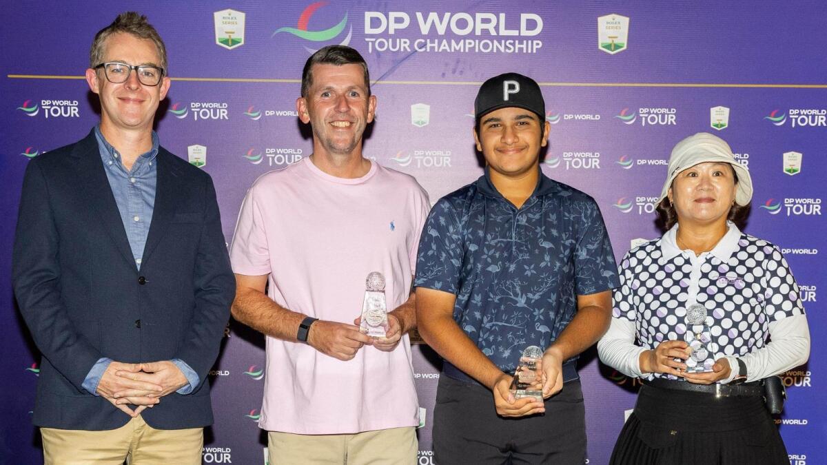 Left to right: Tom Phillips, Head of Middle East, DP World Tour with the Luckiest Ball on Earth winners,who will play in the ROLEX Pro-Am of the DP World Tour Championship: David Warham, Hashem Shana'ah and Misun Kim.- Supplied photo
