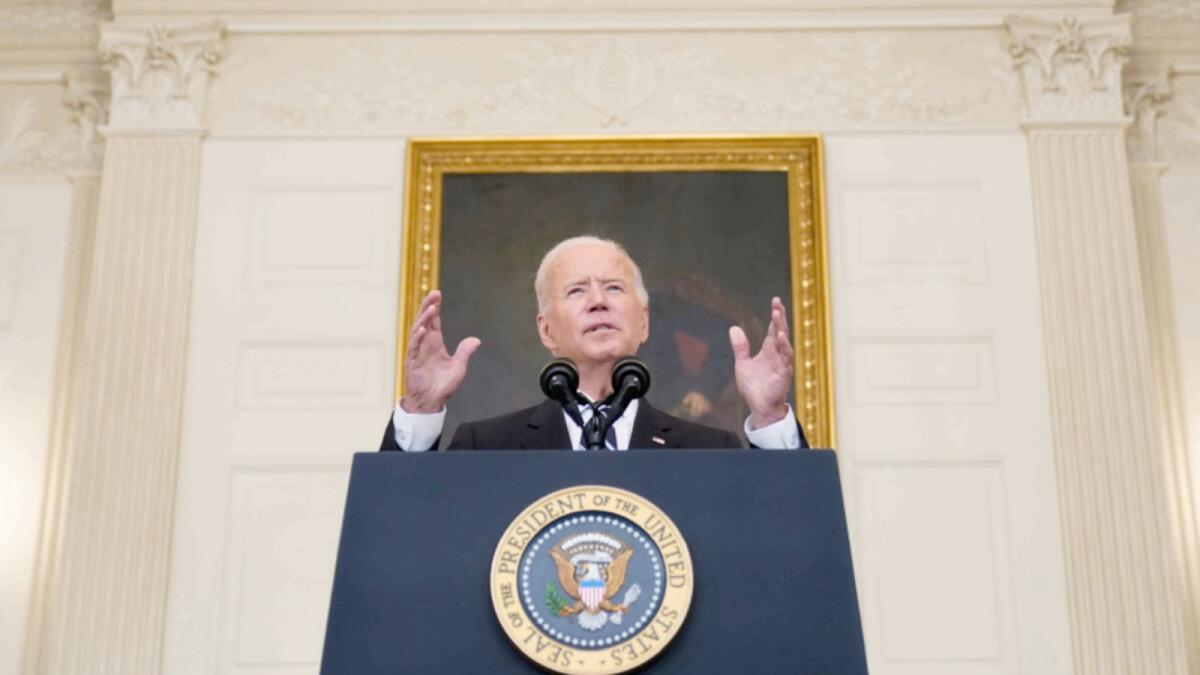 President Joe Biden speaks in the State Dining Room at the White House. — AP