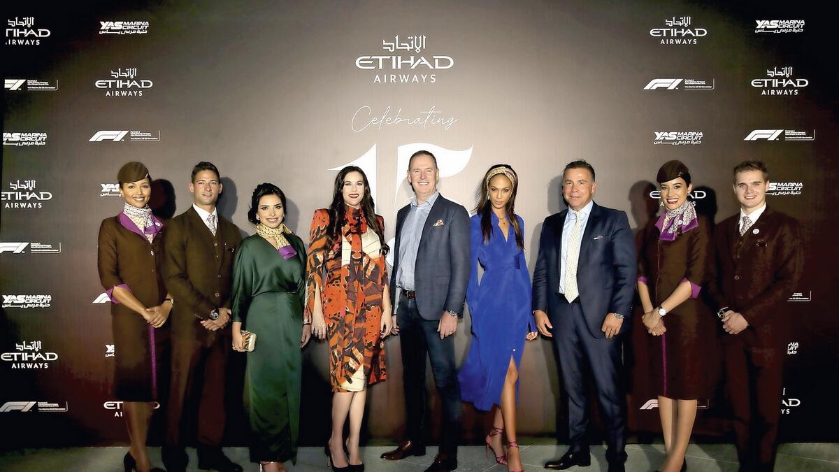 (From third left) Amina Taher, Vice-President — Corporate Affairs at Etihad Aviation Group, Actress Liv Tyler, Tony Douglas, Group CEO Etihad Aviation Group, IMG supermodel Joan Smalls, and Robin Kamark, Chief Commercial Officer Etihad Aviation Group, flanked by Etihad Airways Cabin Crew.