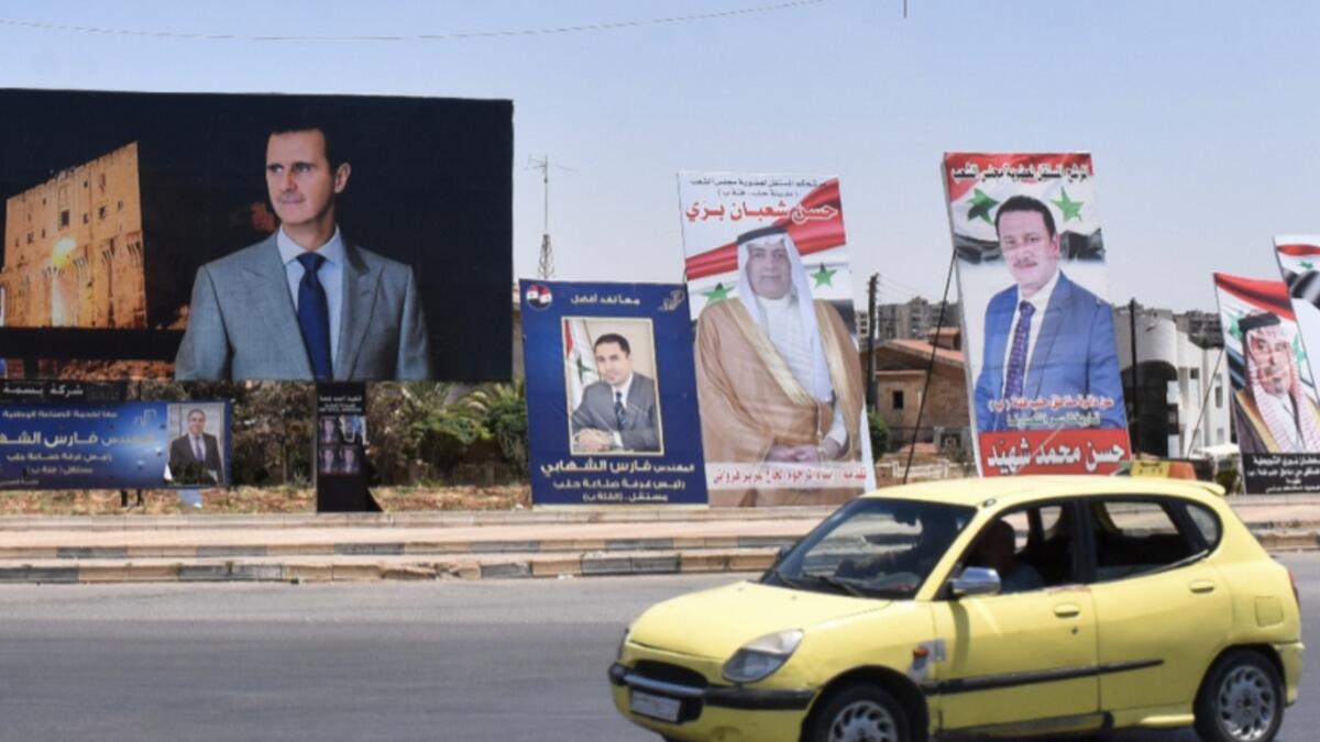 Syrians,  war, economic turmoil, vote, elections 