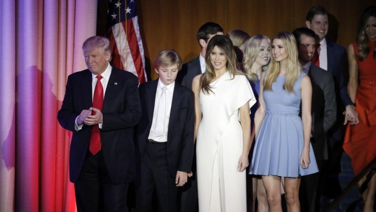 U.S. President-elect Donald Trump, his wife Melania, daughter Ivanka, son Barron and other family members greet supporters during his election night rally in Manhattan, New York, U.S., November 9, 2016. Reuters