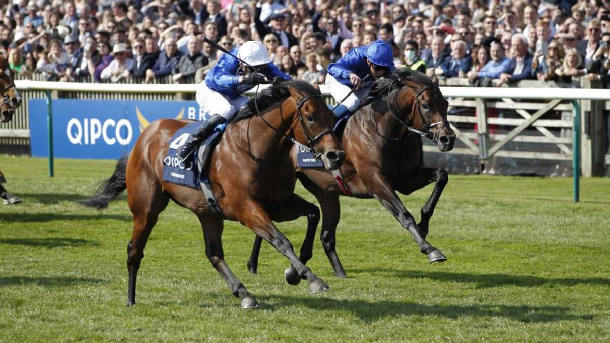 Coroebus, ridden by James Doyle (left), on way to winning the 2000 Guineas from stable companion Native Trail at Newmarket, England, on Saturday. (Godolphin)