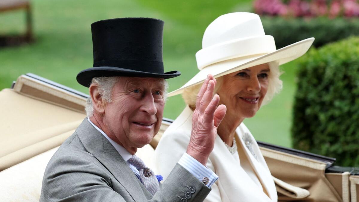 Britain's King Charles and Queen Camilla are  during the Royal procession. - Reuters