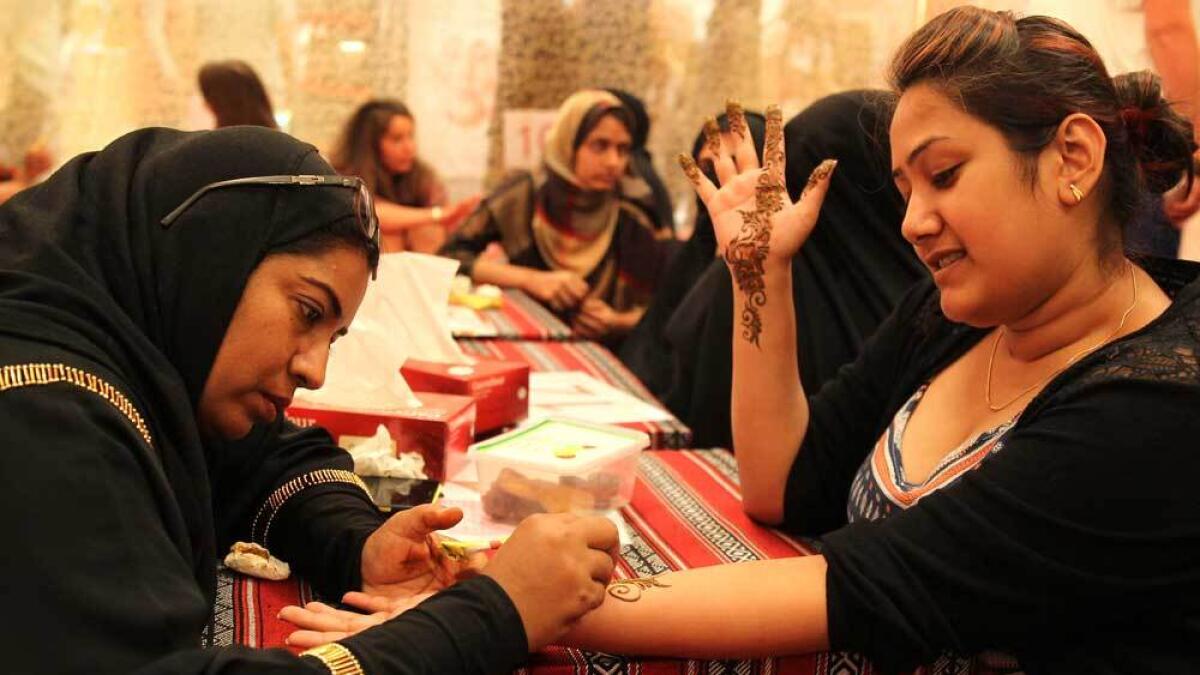 Henna time: The stall is very popular at the market.