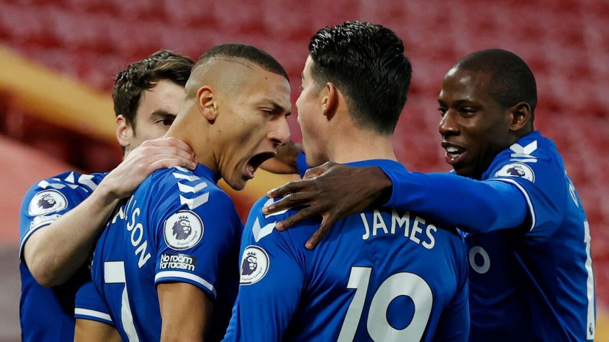 Everton's Richarlison celebrates his goal with teammates. — Reuters