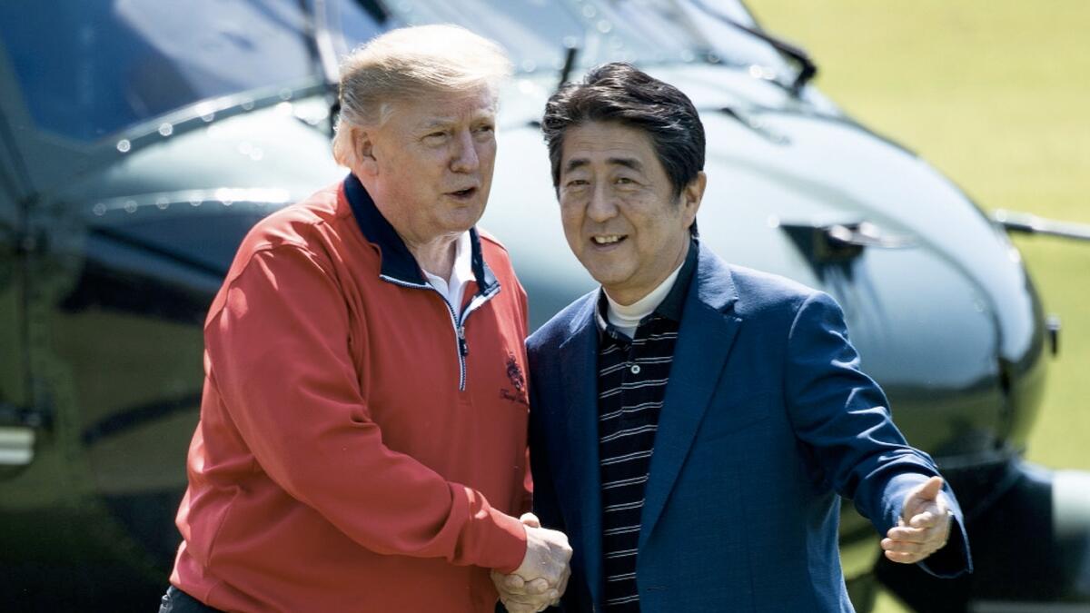 Trump tees off Japan summit with Abe golf match 
