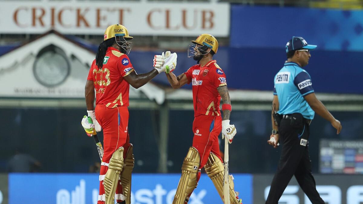 KL Rahul (right) and Chris Gayle celebrate after the match against the Mumbai Indians. — BCCI/IPL