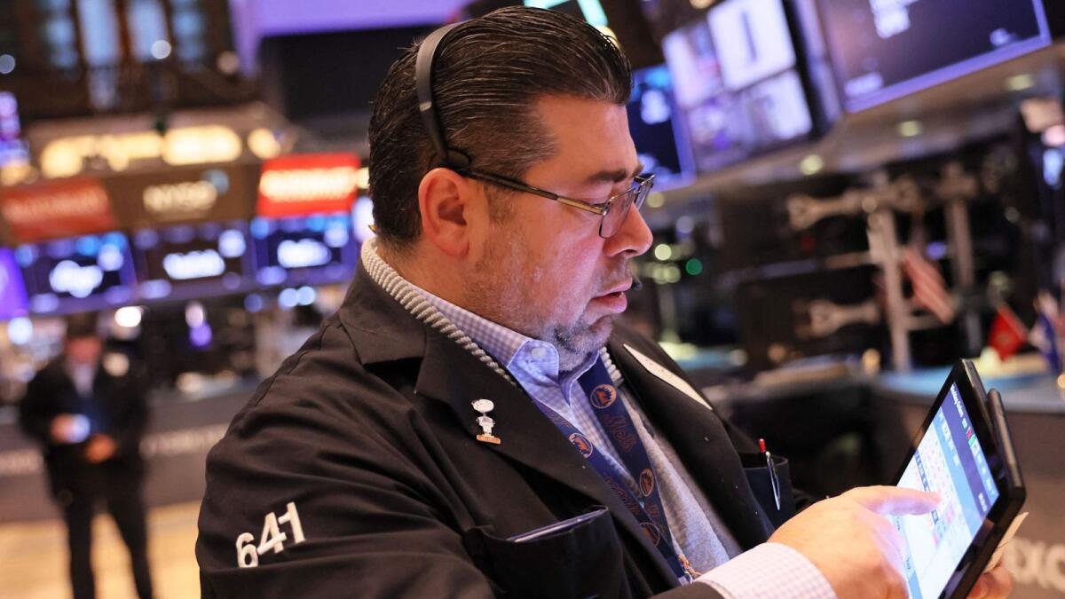 Traders operate under the New York Stock Exchange.  - AFP