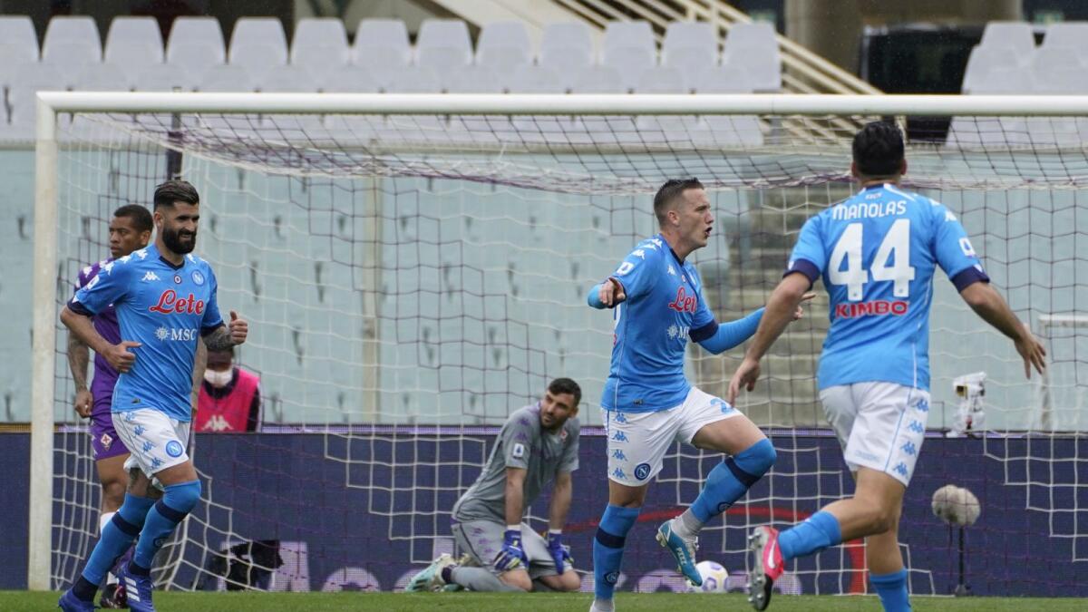Napoli players celebrate a goal against Fiorentina.— Reuters
