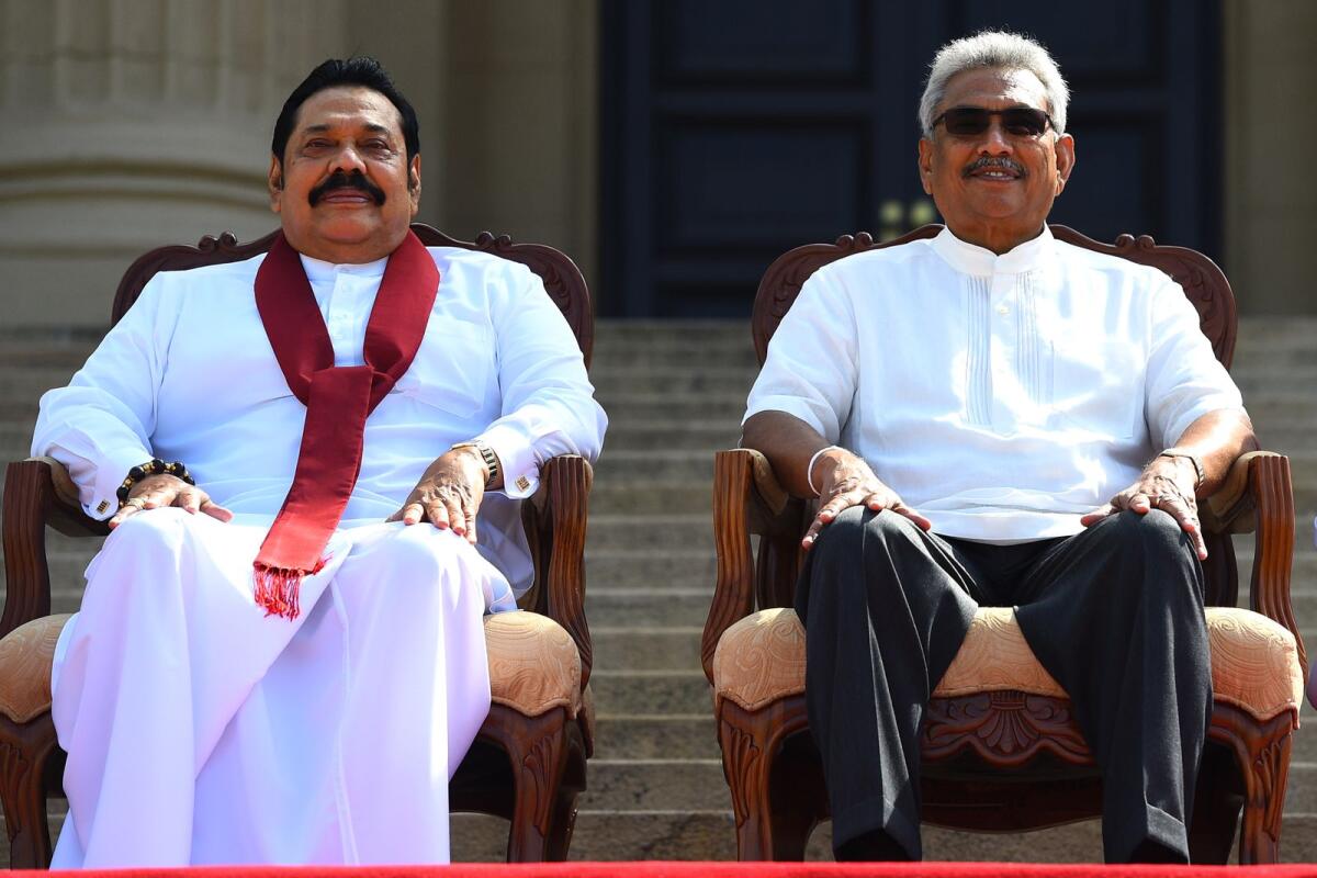 FILE. Sri Lanka's new President Gotabaya Rajapaksa (R) and his Prime Minister brother Mahinda Rajapaksa. Photo: AFP