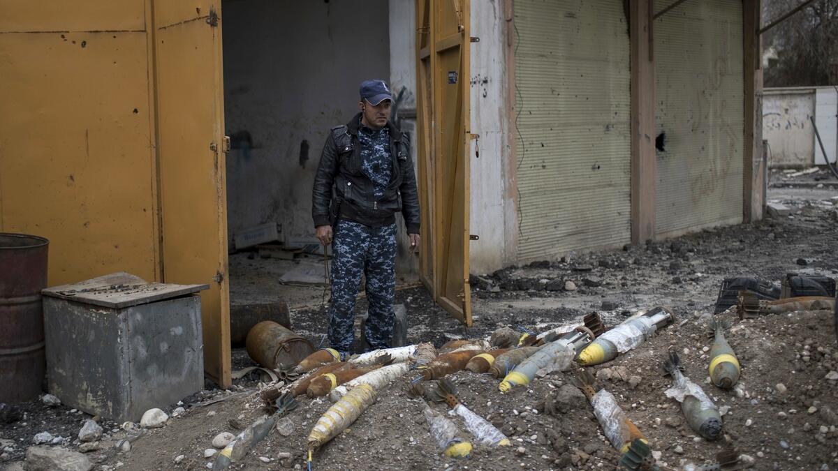 Unexploded bombs dot Iraqi cities