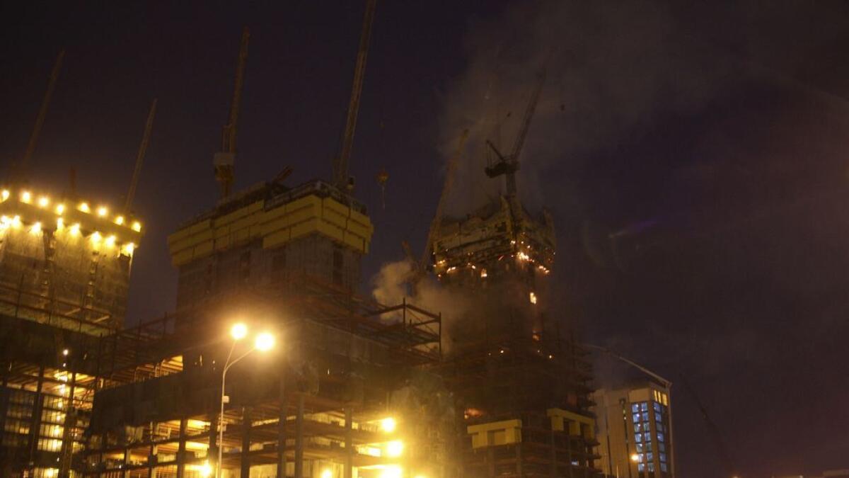Smoke rises from the Abu Dhabi Plaza in Astana, Kazakhstan, February 13, 2016. Reuters photo