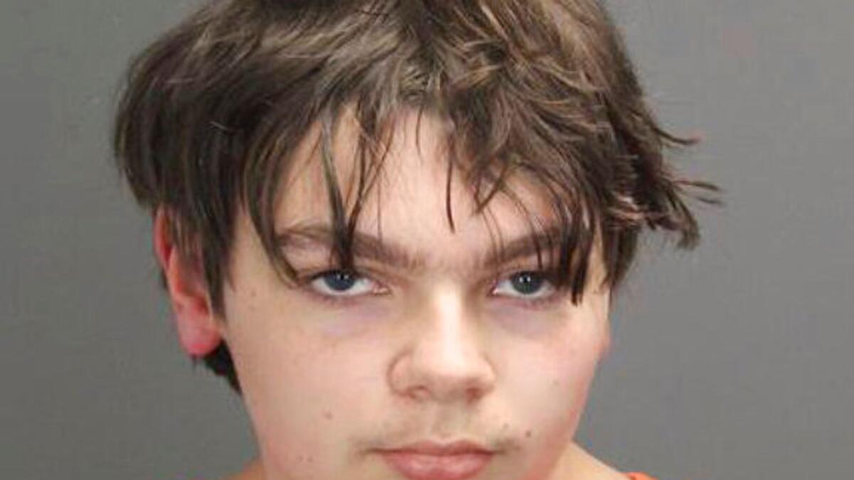 This booking photo released by the Oakland County, Mich., Sheriff's Office shows Ethan Crumbley, 15, who is charged as an adult with murder and terrorism for a shooting that killed four fellow students and injured more at Oxford High School in Oxford, Mich., authorities said Wednesday, Dec. 1, 2021. (AP)