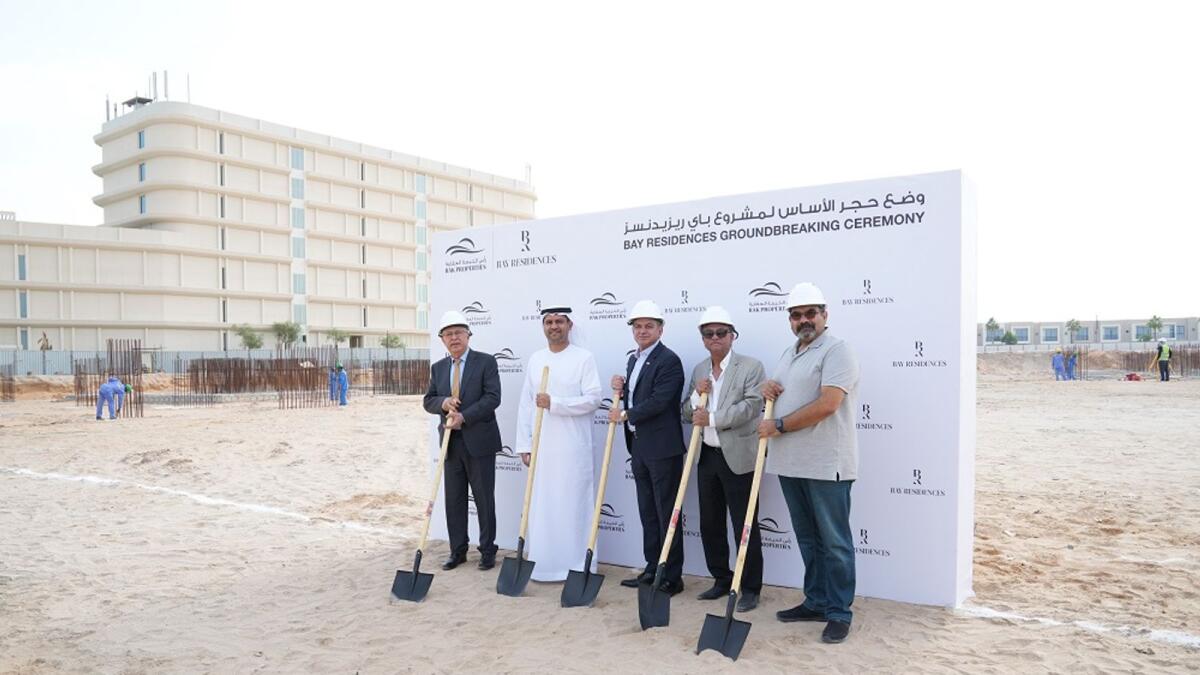 Sameh Al Muhtadi, RAK Properties’ CEO, and Mohammed Al Tair, RAK Properties’ COO, alongside several senior staff and members of Al Oroba Contracting Co, at the groundbreaking ceremony to signify the beginning of construction work on the latest waterfront addition to Hayat Island, Mina Al Arab, Ras Al Khaimah — Bay Residences. — Supplied photo