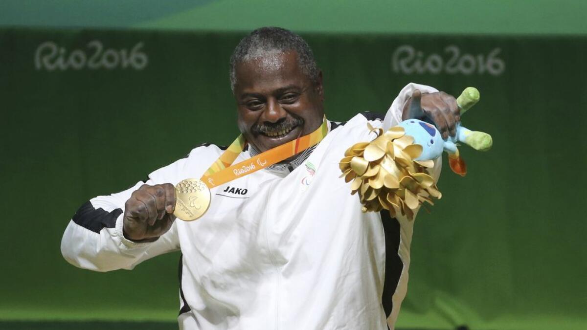 Mohammed Khalaf celebrates with his gold medal