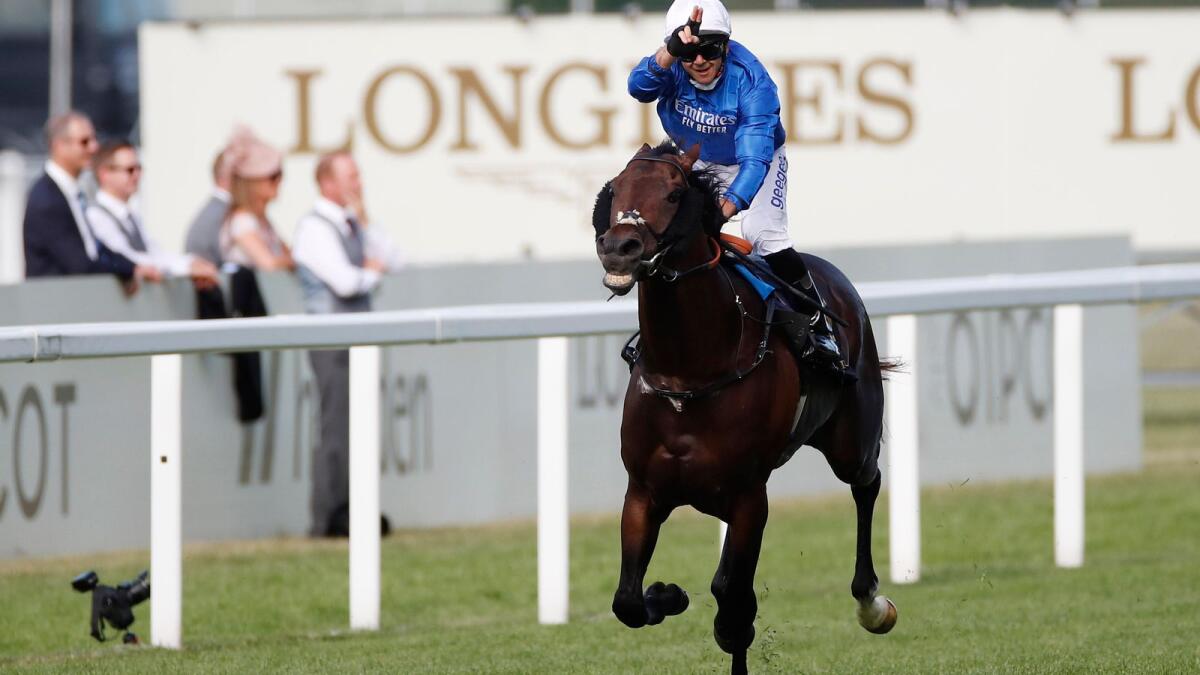 Real World, ridden by Marco Ghiani, wins the Royal Hunt Cup. (Reuters)