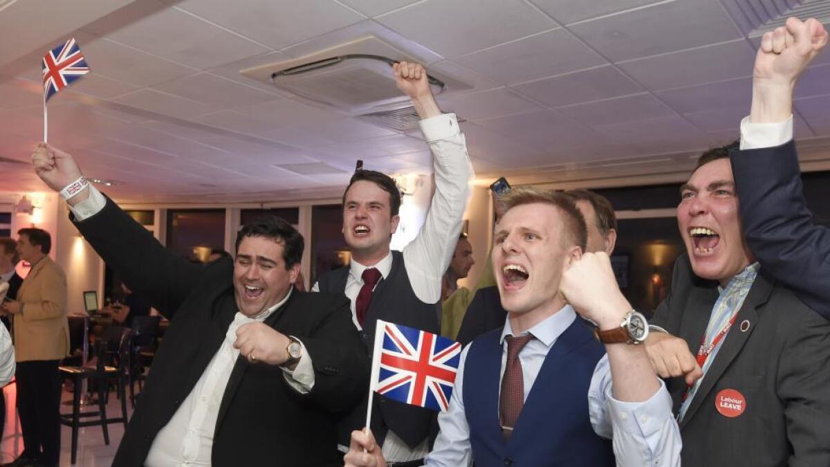 Leave supporters cheer results at a Leave.eu party after polling stations closed in the Referendum on the European Union in London