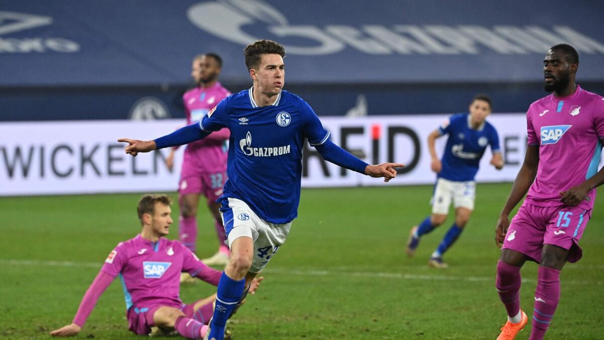 Schalke's US forward Matthew Hoppe (left) celebrates his goal against Hoffenheim. — AFP