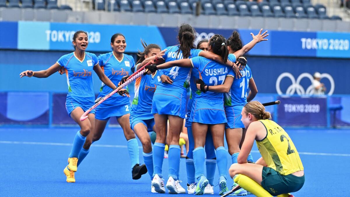 Indian players celebrate after defeating Australia 1-0 in the women's quarterfinal match at the Tokyo 2020 Olympics. (AFP)