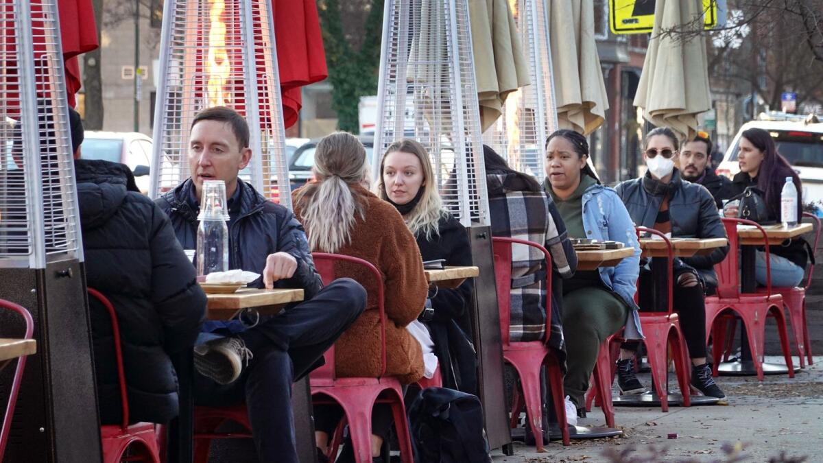 Despite temperatures in the mid-forties, customers continue to patronise restaurants and bars in the Wicker Park neighbourhood on November 11, 2020 in Chicago, Illinois.