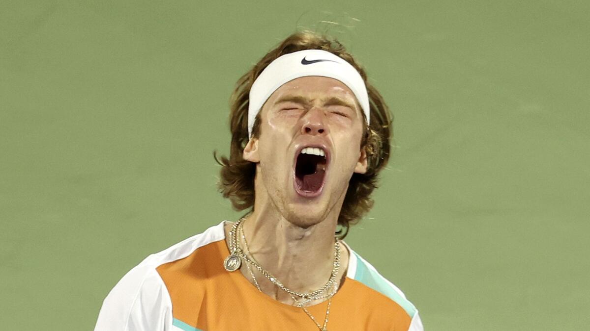 Russia's Andrey Rublev celebrates a point against Poland's Hubert Hurkacz during their semifinal at the ATP Dubai Duty Free Tennis Championships. (AFP)